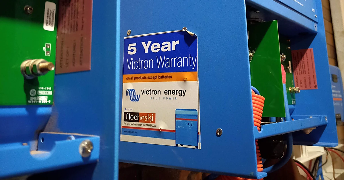 Nocheski Solar Warranty sticker on solar equipment warranty documents with a customer site Ghana